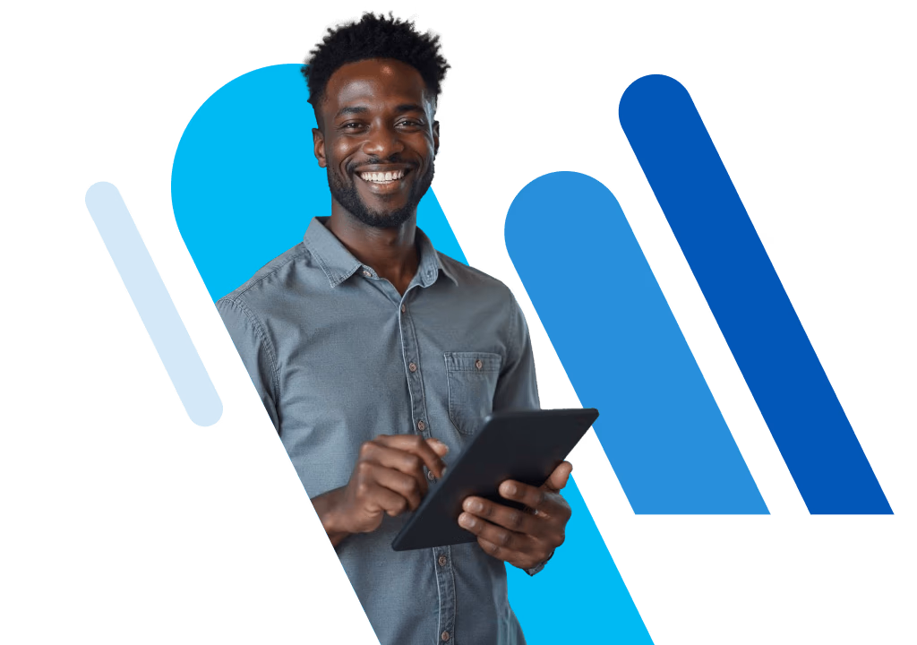Smiling man managing his website from a tablet