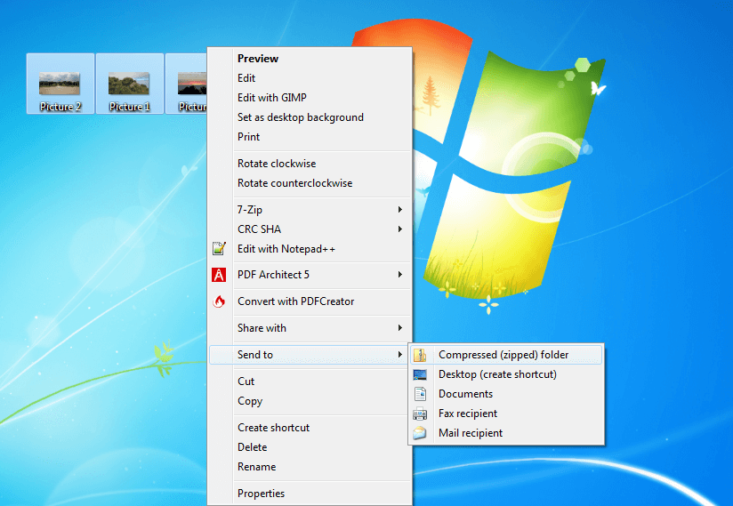 Screenshot of the Windows desktop where multiple files are sent to a ZIP-compressed folder via the context menu.