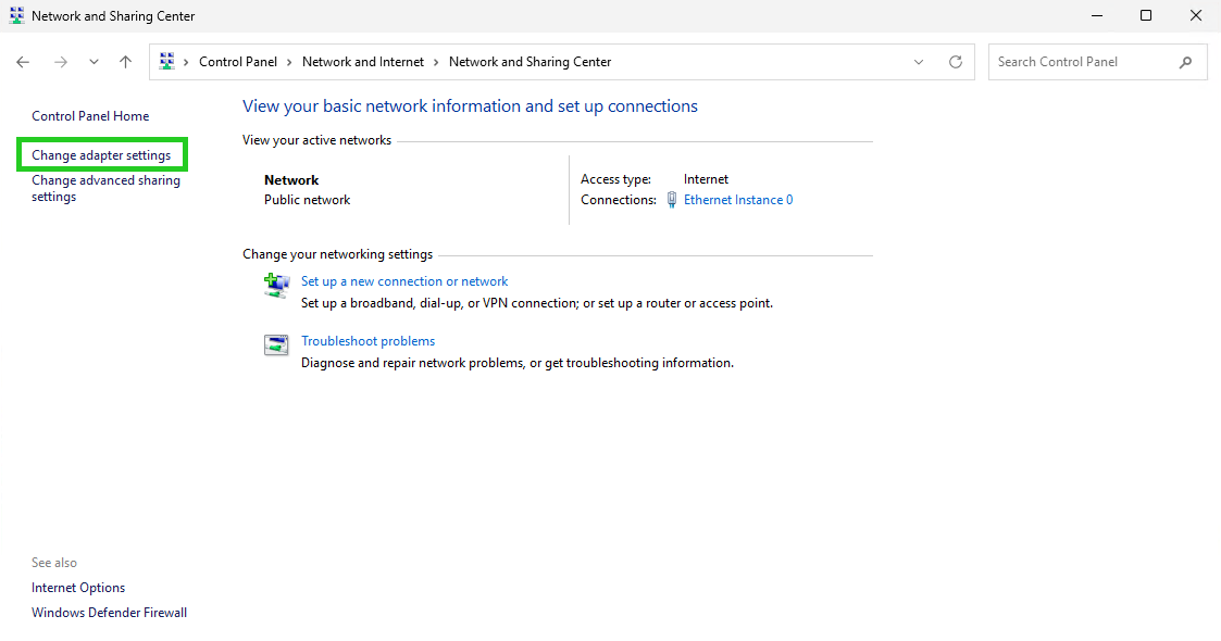 The Network and Sharing Center with the Change adapter settings option highlighted.