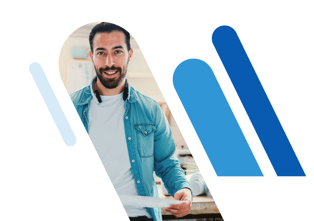 Portrait of a smiling man in a modern office, framed by abstract blue graphic shapes.